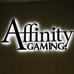 Halo lit stainless steel sign for affinity gaming